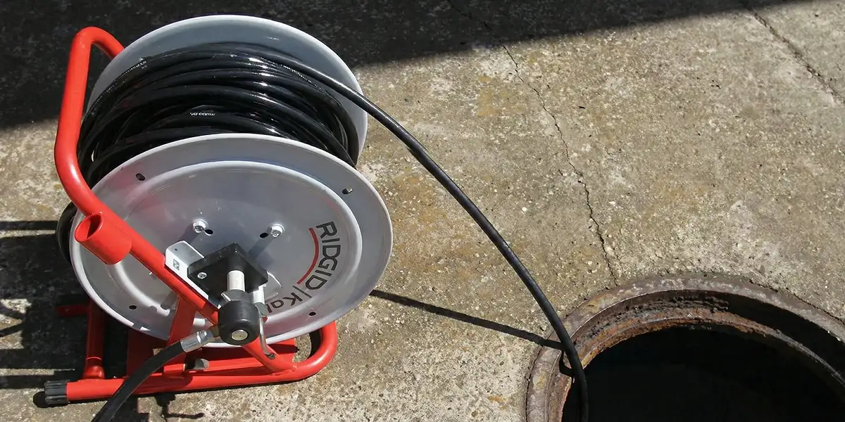 sewer rodding equipment prepared to clear clogged sewer lines in Allentown, PA